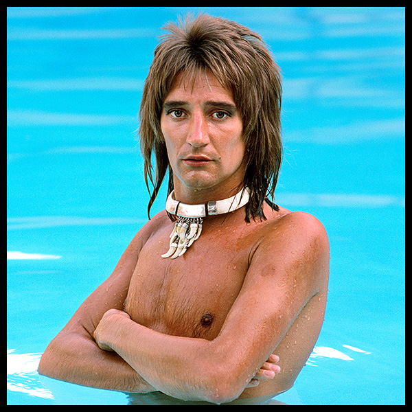 exclusive photograph of singer rod stewart in his swimming pool by photographer david steen